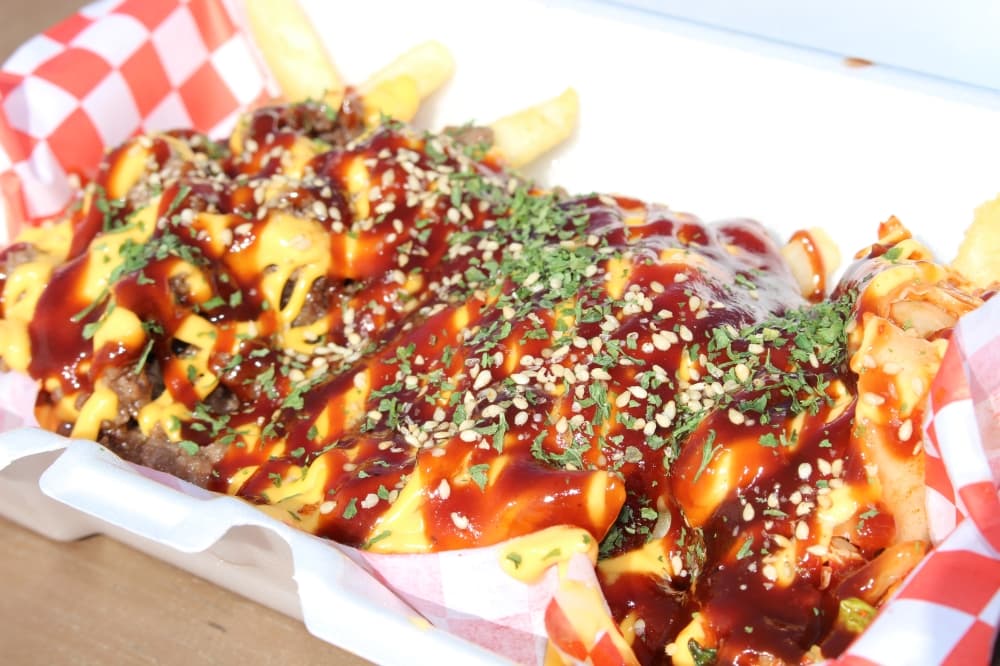 Kimchi beef fries ($10): A Korean staple, this dish consists of french fries, stir-fried beef and marinated cabbage. (Wesley Gardner/Community Impact Newspaper)