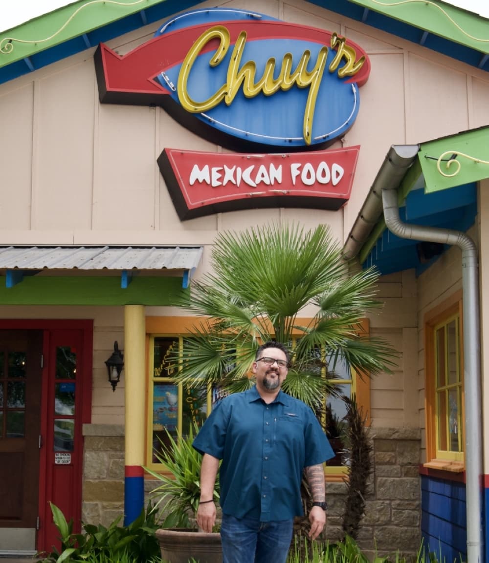 
General Manager Abel Fragoso stands in front of Chuy’s Arbor Trails location in Southwest Austin.
