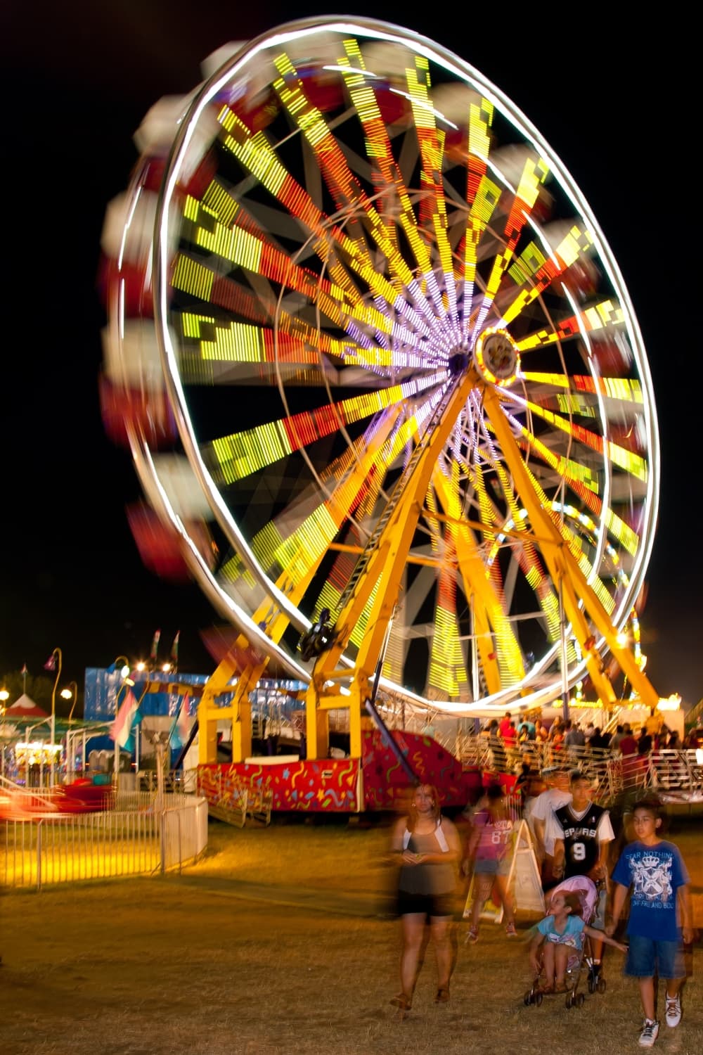 Festival-goers enjoy the ferris wheel at the 2012 Poteet Strawberry Festival. (Courtesy of the Poteet Strawberry Festival Association/Community Impact Newspaper)
