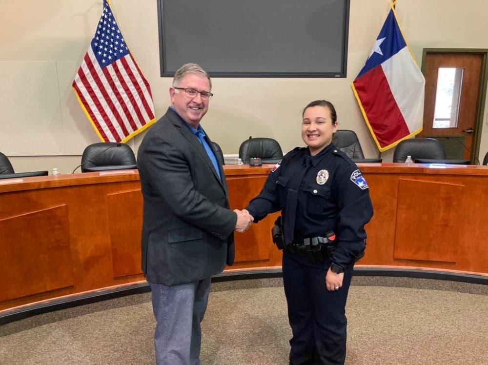 Saucedo shakes hands with Lakeway Mayor Tom Kilgore.