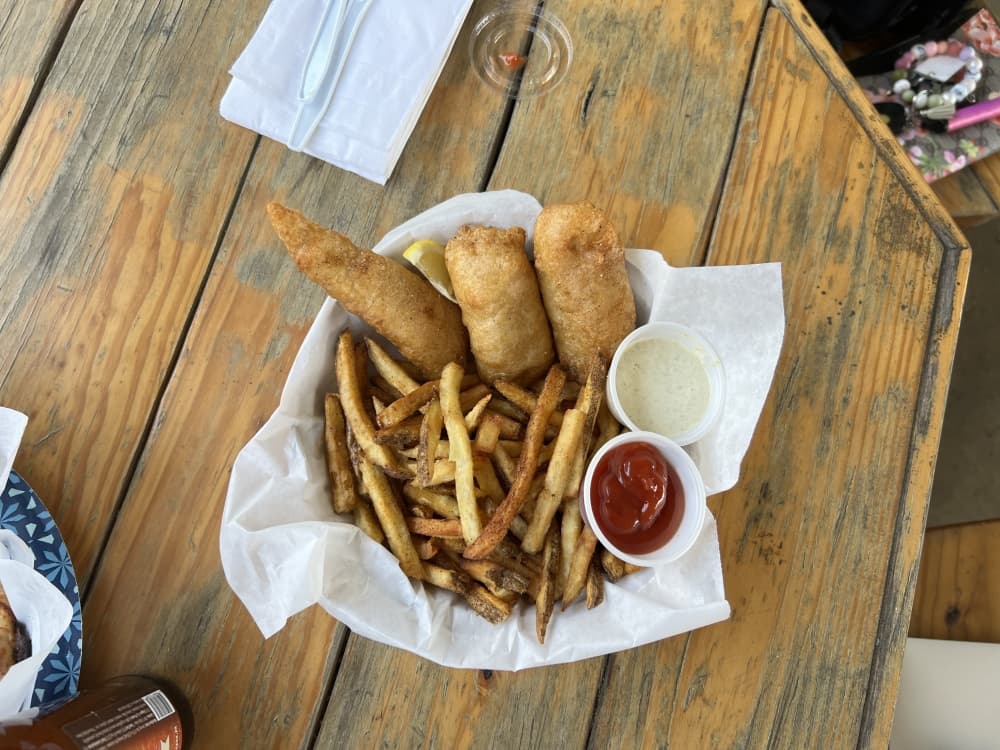Fish and chips ($15 for three pieces) features Fresh cod flown in from Maine battered with beer from Copperhead Brewery and served with hand-cut french fries. (Maegan Kirby/Community Impact Newspaper)