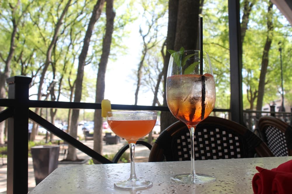 Juliet's drink program includes cocktails such as the Italian sunrise ($12) and the aperol spritz ($12). (Claire Shoop/Community Impact Newspaper)