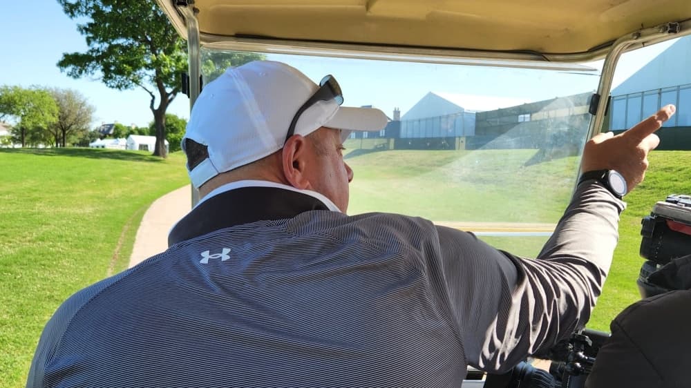 Jon Drago, AT&T Byron Nelson tournament director, points out amenities that have been added to this year's event during an April 26 media preview. (Miranda Jaimes/Community Impact Newspaper)