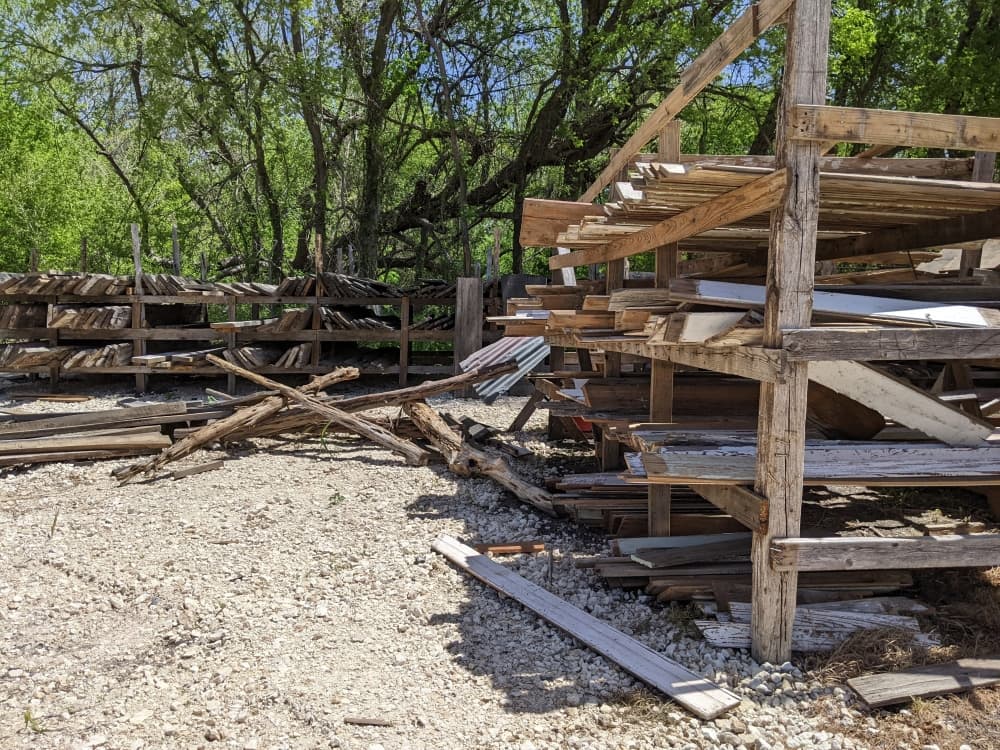 Reclaimed lumber is sorted and stored in This Old Wood's lumberyard until it is used for a project. (Carson Ganong/Community Impact Newspaper)