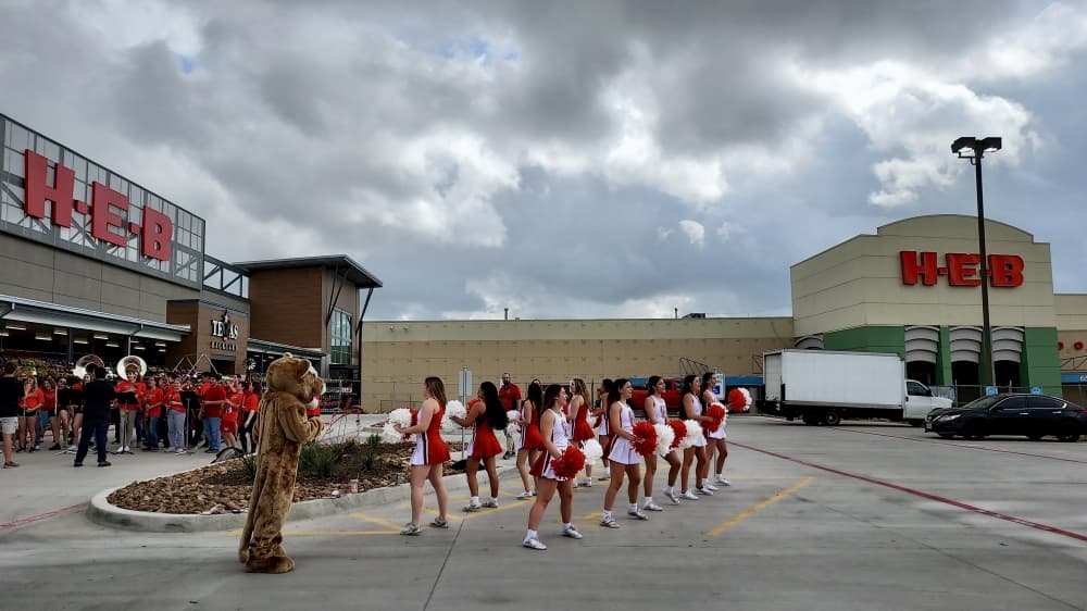 The Canyon High School marching band and cheer team attended the celebration April 28. (Lauren Canterberry/Community Impact Newspaper)