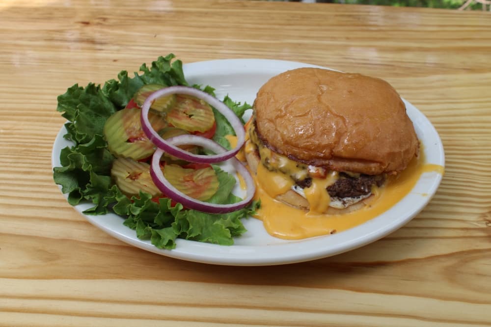 The Gristburger ($10.99) is a 1/2-pound all-beef patty smothered in spicy homemade queso. It offers a unique take on the cheeseburger.