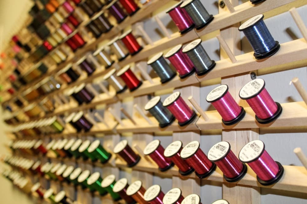 Thread used for fly tying comes in different types, such as wool and wire. (Bailey Lewis/Community Impact Newspaper)
