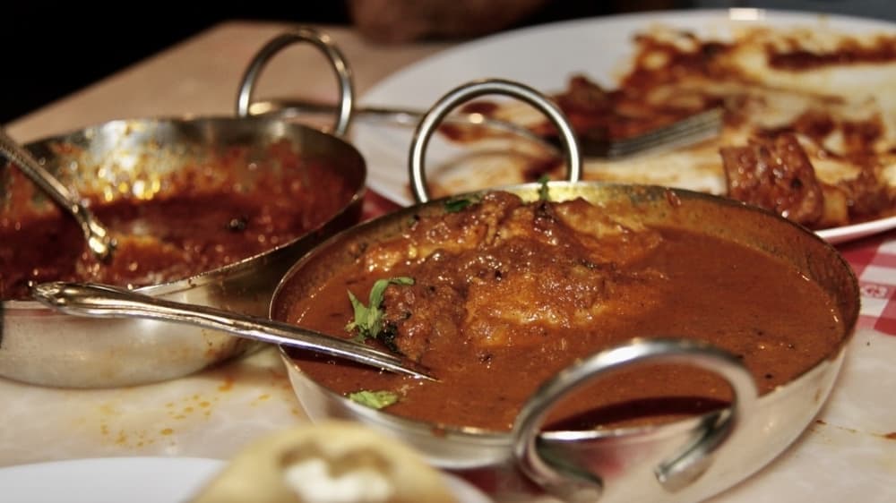 Patrons can order from the a la carte menu, which features Chettinad chicken curry. (Sumaiya Malik/Community Impact Newspaper) 