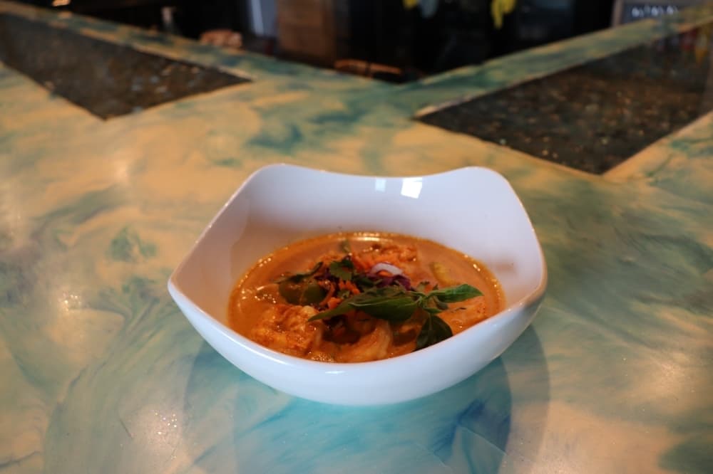 Seafood Gapro ($26) features sautéed onions and garlic in an oyster-based sauce. (Cynthia Zelaya/Community Impact Newspaper)