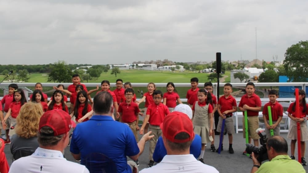 Second graders from the Momentous Institute performed a song for the AT&T Byron Nelson opening ceremony held May 10. (Miranda Jaimes/Community Impact Newspaper)