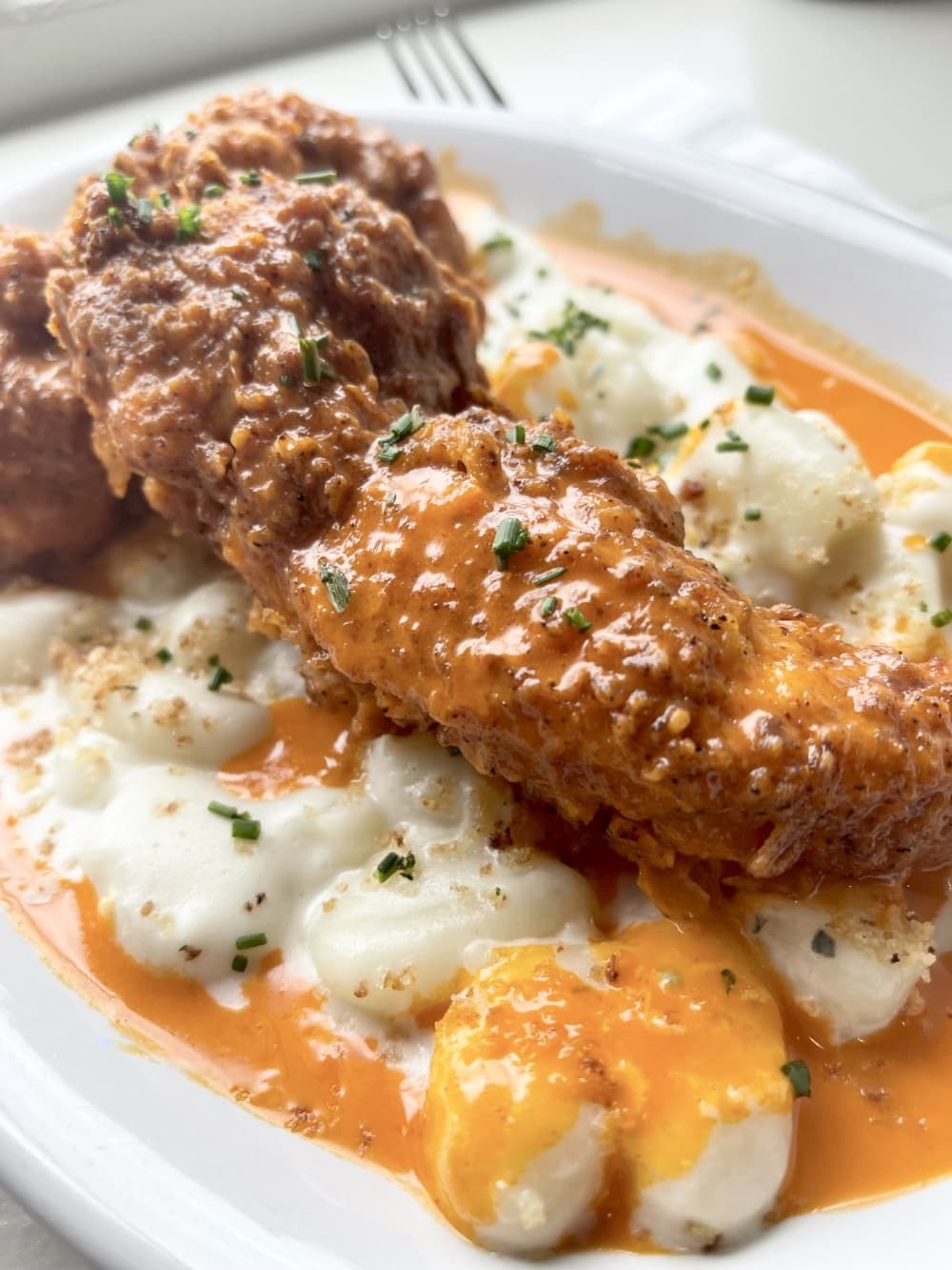 Buffalo Chicken Gnocchi includes crispy buffalo chicken tenders, potato gnocchi, blue cheese cream, bacon panko crunch and chives, $18. (Courtesy Goodfolks)
