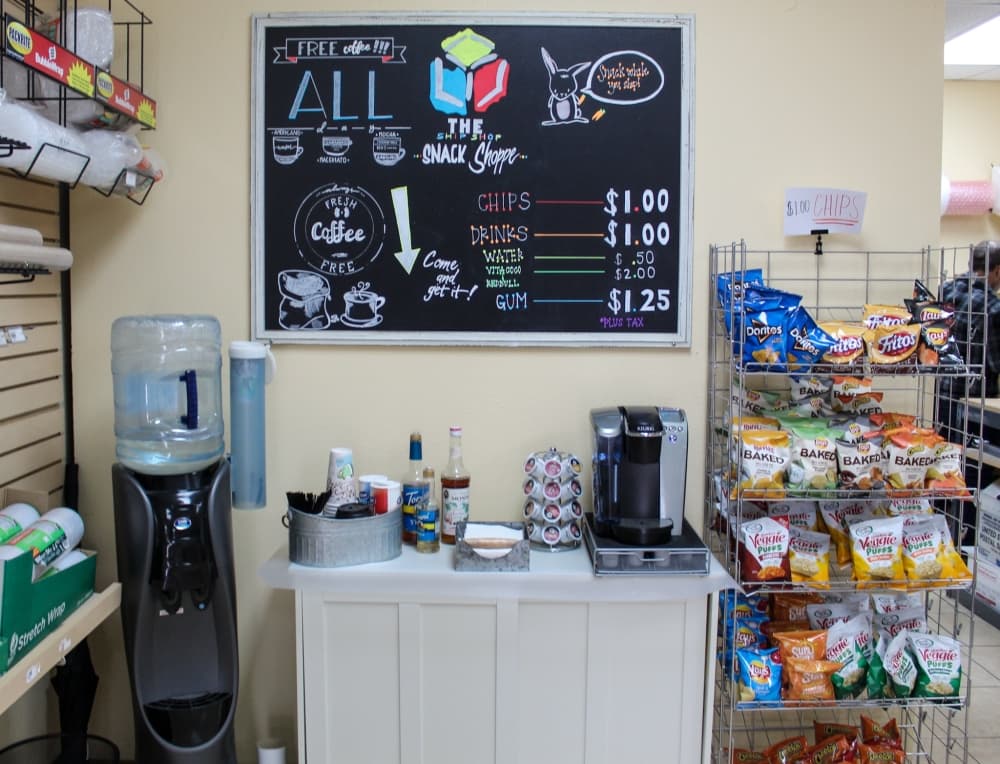 A snack shop sells chips and gum and offers free coffee. (Bailey Lewis/Community Impact Newspaper)