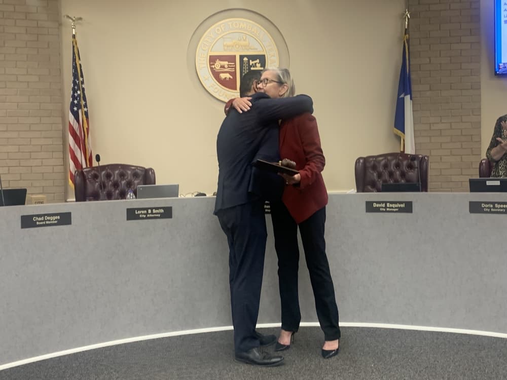 City Manager David Esquivel honored Gretchen Fagan at her last Tomball City Council meeting as mayor on May 16. (Kayli Thompson/Community Impact Newspaper)