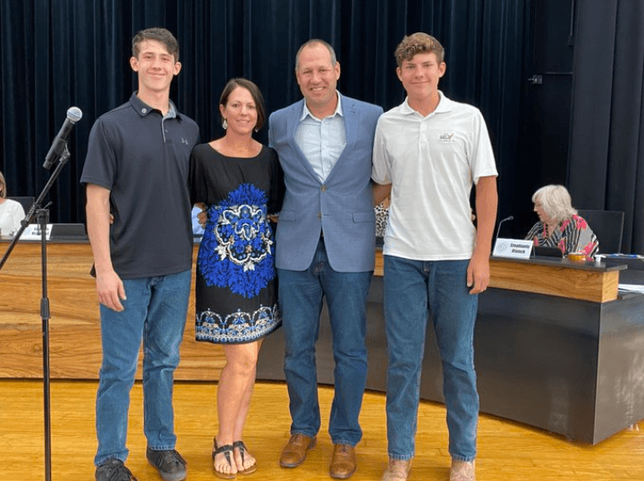 James Scherer and his family are seen at the GISD board meeting May 16. (Courtesy Georgetown ISD)