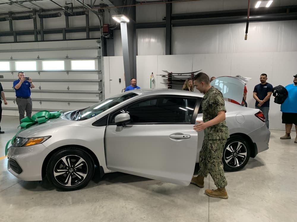 Navy sailor receives vehicle