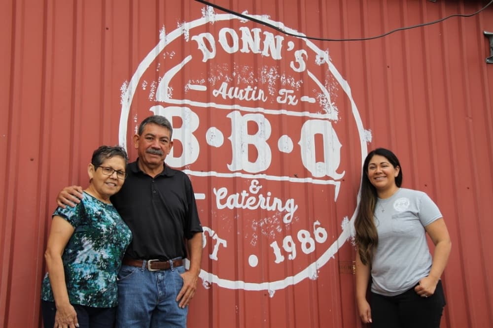 Jose Guerrero, owner of Donn’s Barbecue with his wife Denise, and daughter, Maria Pena. (Sumaiya Malik/Community Impact Newspaper)