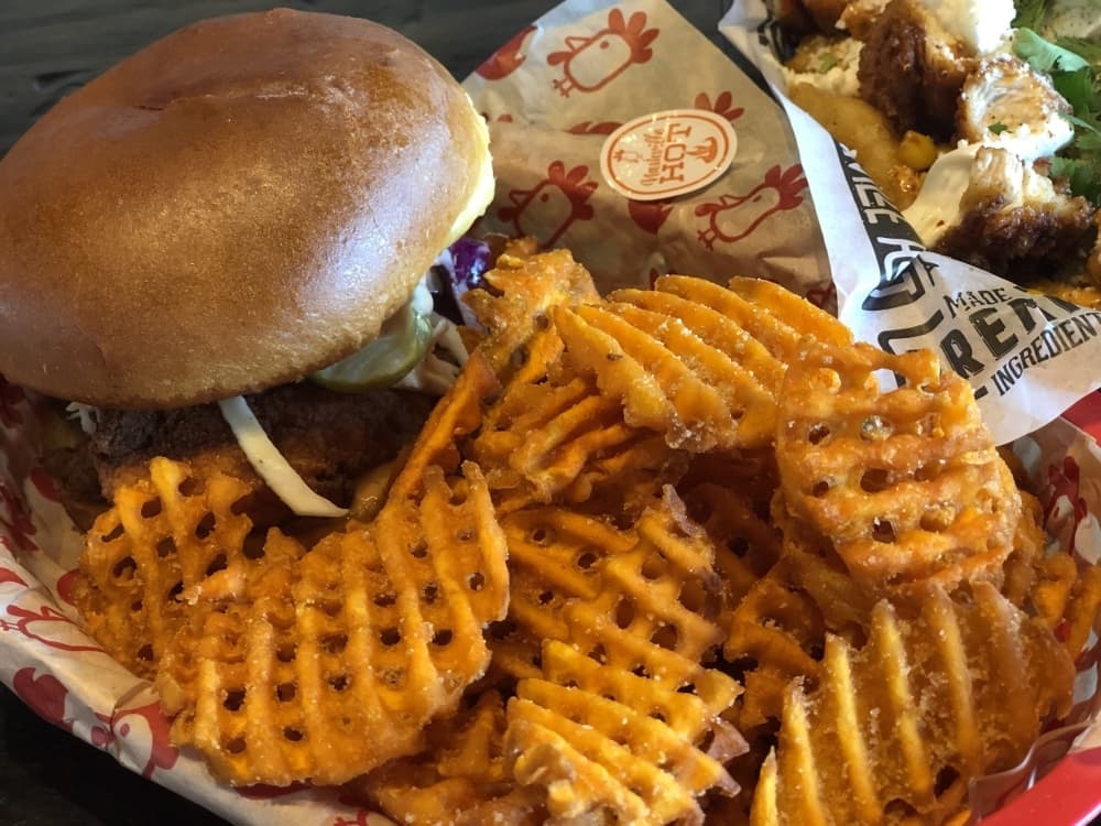 
Urban Bird’s signature Tenders Sando ($12) is two tenders on a toasted bun with kale slaw, bird sauce and pickles.