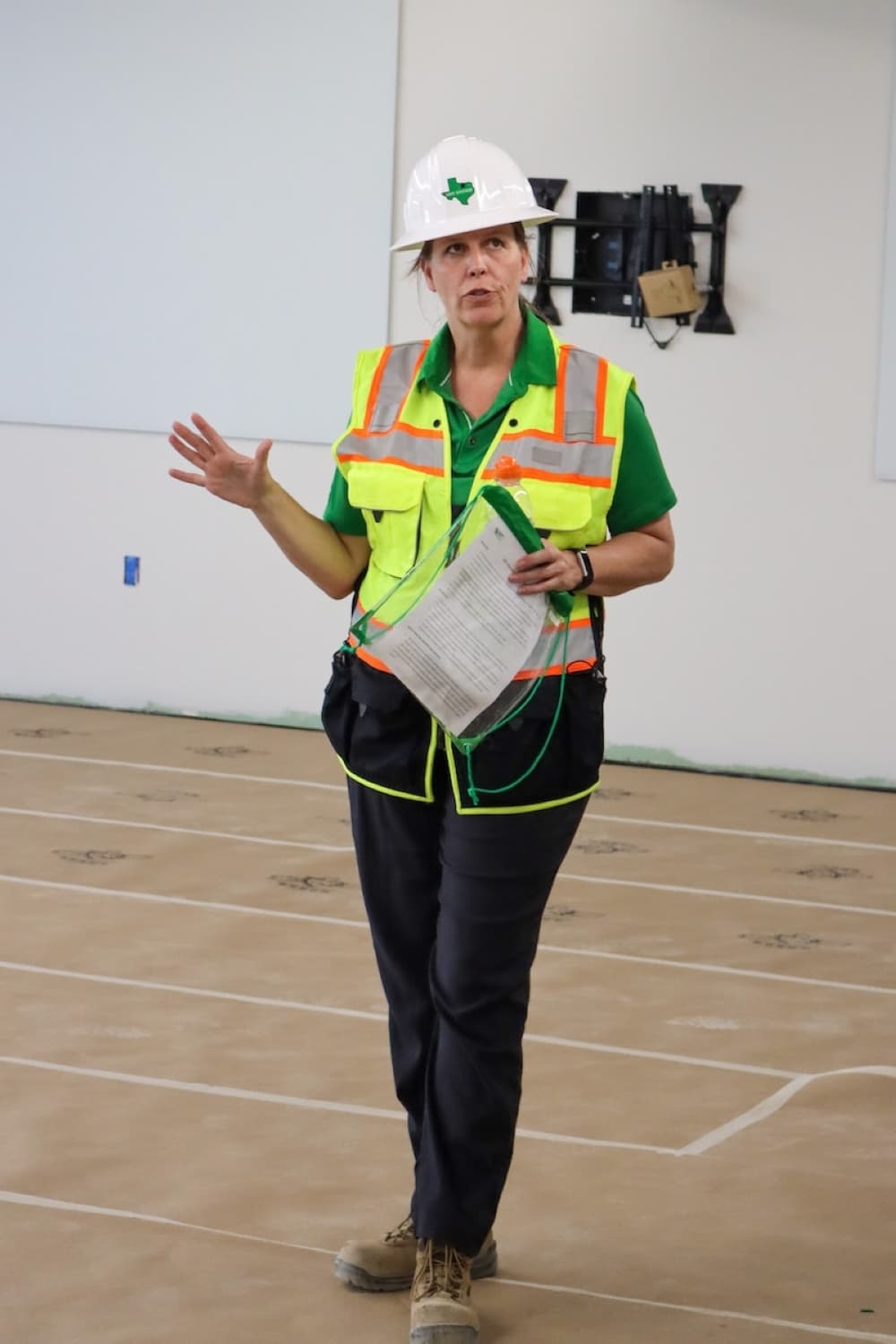 Jeannine Vail, senior project manager for UNT System, provides information along the tour May 20. (Grant Johnson/Community Impact Newspaper)