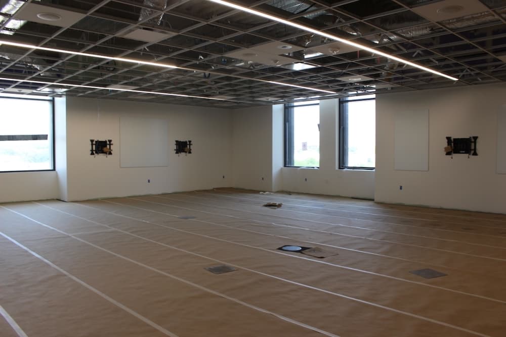This large classroom provides white boards and views of the city of Frisco. (Miranda Jaimes/Community Impact Newspaper)
