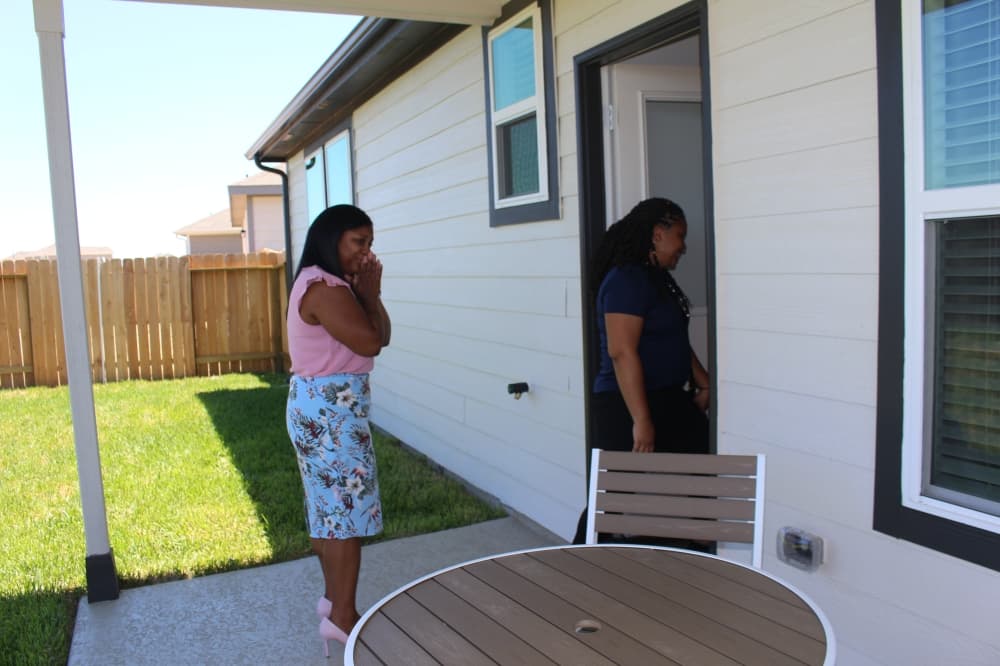 Army Spc. Kisha Dorsey saw her mortgage-free home for the first time May 26. (Kayli Thompson/Community Impact Newspaper)