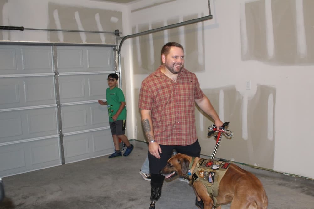 Army Sgt. James Ford saw his mortgage-free home for the first time May 26. (Kayli Thompson/Community Impact Newspaper)