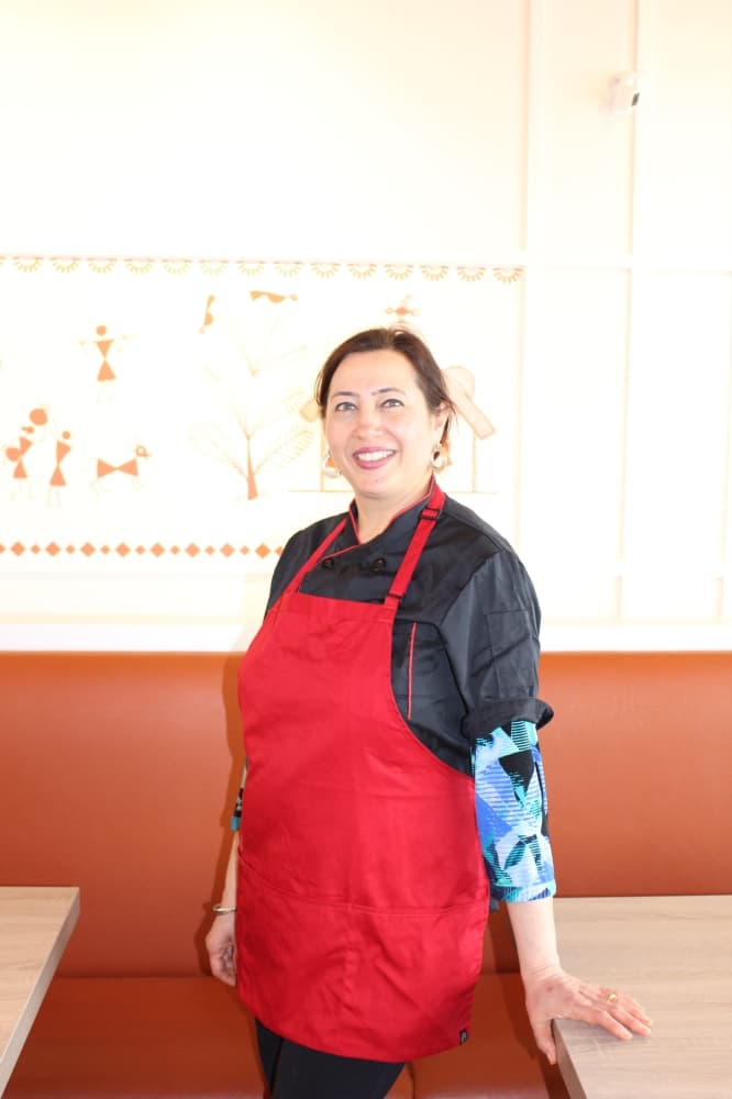 Chanchal Dhillon is the head chef and owner at Indian Kitchen. (Brooklynn Cooper/Community Impact Newspaper)