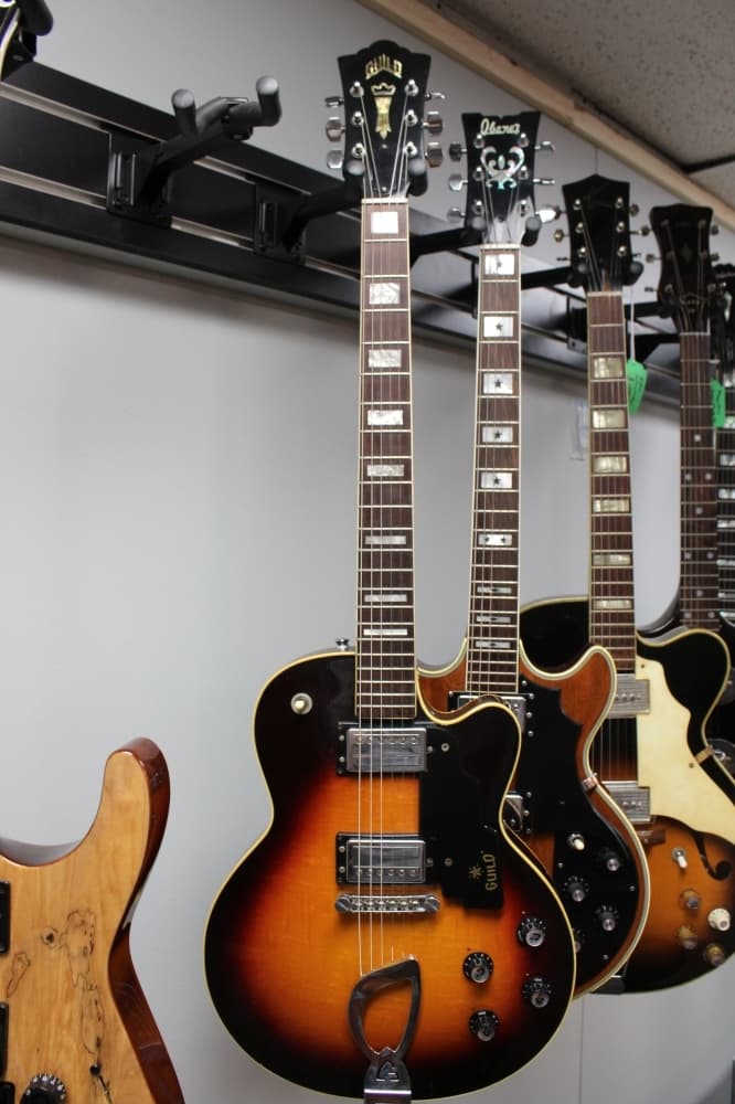 The shop specializes in vintage gear, such as this 1972 Guild.
