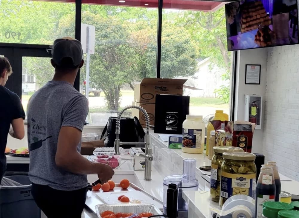 
Chefs prepare food at Cibo Kitchens.