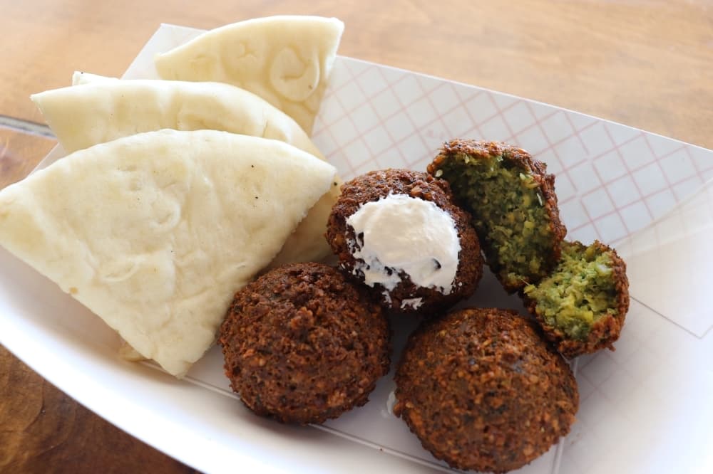 To complete the trifecta, the menu also features Mediterranean dishes, such as the falafel ($5) served with tahini sauce and sides of pita bread ($.89).
