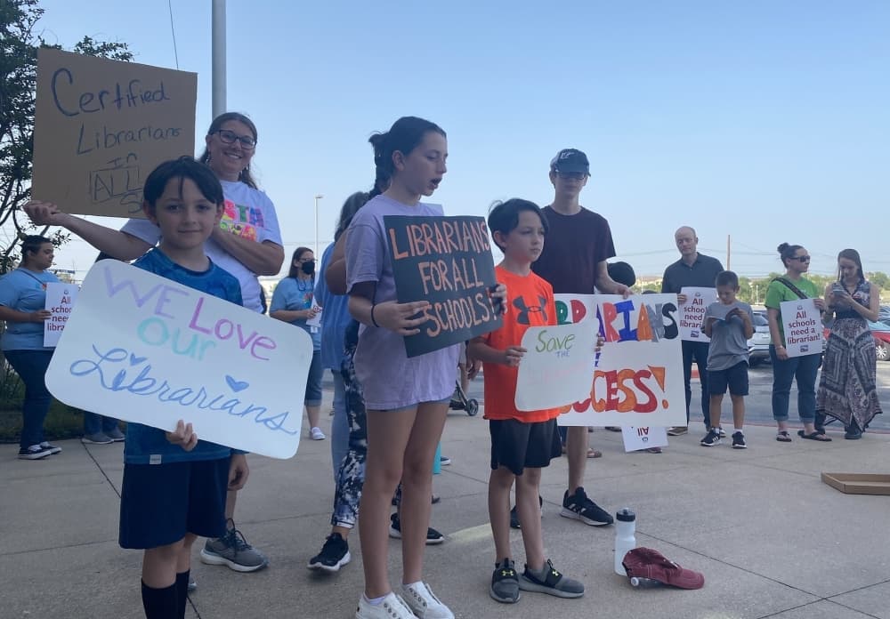 Pflugerville education group protests district pilot program to have aide positions helm two campus libraries