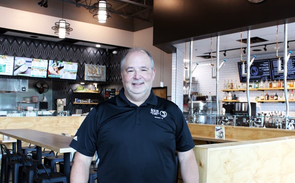 Carlos Gonzalez is the owner of Roll On In Sushi and Buzzed Bull Creamery. (Karen Chaney/Community Impact Newspaper)
