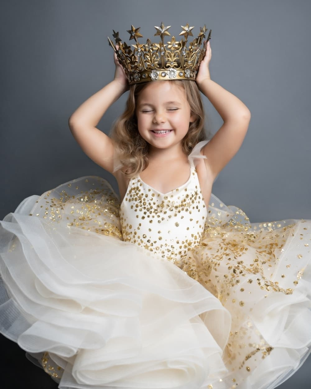 little girl with dress and crown