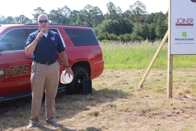 ESD 15 Commissioner "Bear" Wilson speaks during the groundbreaking June 27. (Anna Lotz/Community Impact Newspaper)