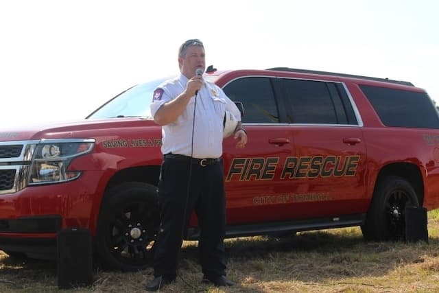 Tomball Fire Chief Joe Sykora speaks during the groundbreaking June 27. (Anna Lotz/Community Impact Newspaper)