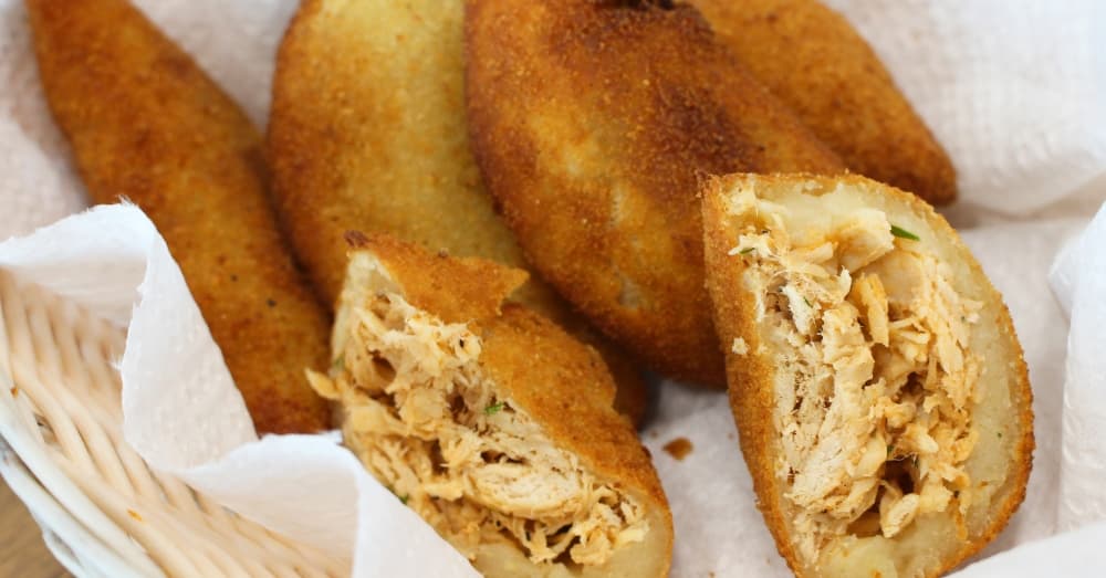 Coxinha ($1.65-$7.95): Shredded, seasoned chicken is covered in dough, battered and fried. (Wesley Gardner/Community Impact Newspaper)
