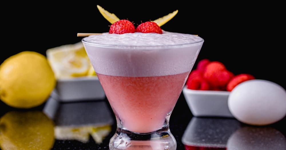 Clover Club ($9): This raspberry cocktail is topped with whisked egg white fluff and raspberries. (Courtesy Mirage 38)