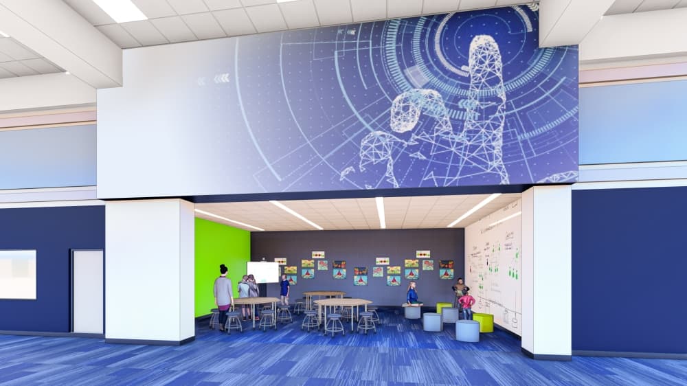 Children do various activities in a nook equipped with tables and white boards. 
