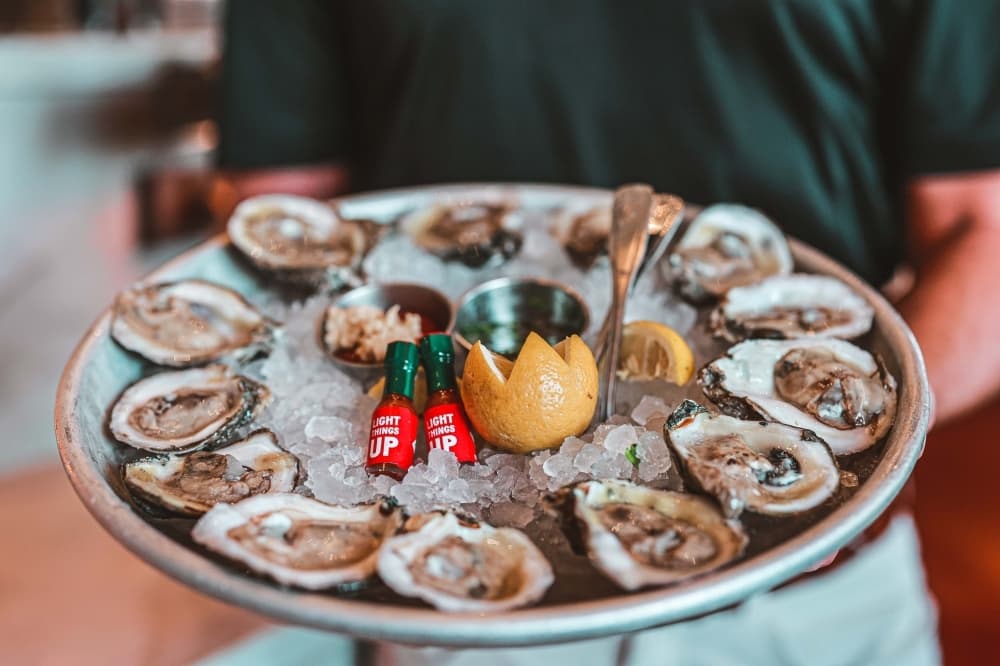 Oysters on the half shell are delivered fresh daily and can be served raw or grilled. $15-$29 depending on weight and preparation. (Courtesy McAdoo's)