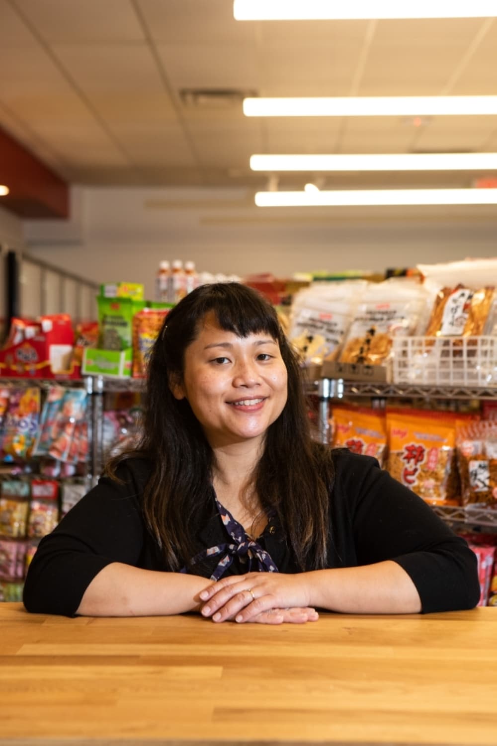 Asahi Imports owner Sally Matsumae is the third generation in her family to own the ethnic food store. (Chloe Young/Community Impact Newspaper)