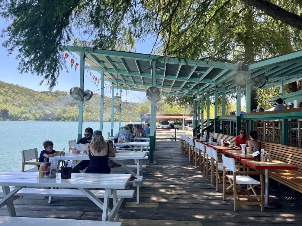 shaded outdoor seating on lake