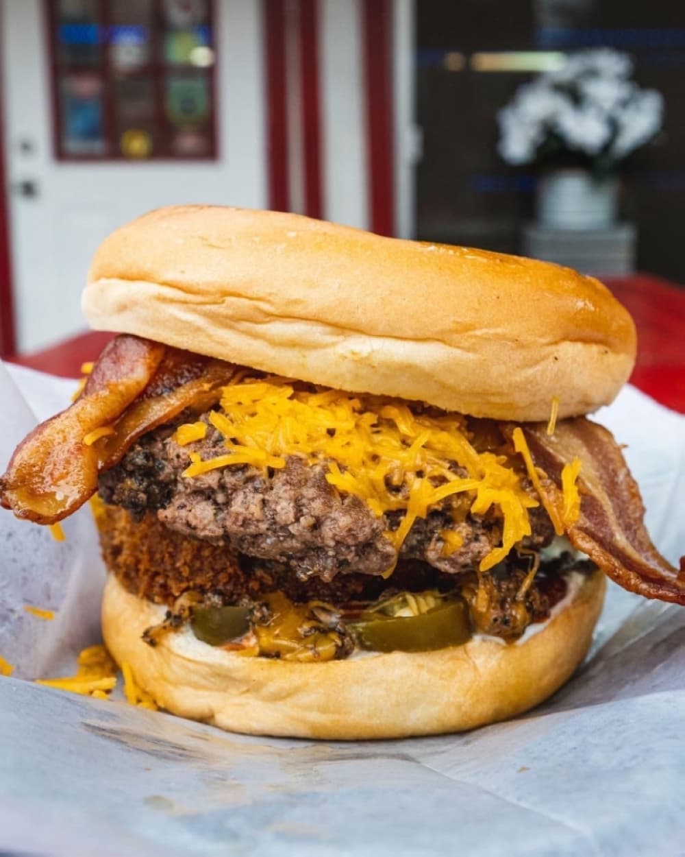 Midtown ($12.95): This burger is served with bacon, an onion ring and jalapenos with a barbecue sauce and ranch mix. (Courtesy Lankford's)