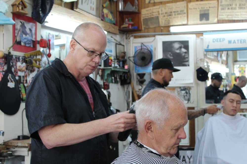Heights barber shop carries on legacy of beloved owner