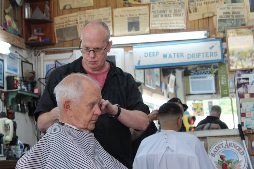 Jeff Armstong first joined Doug's Barber Shop in 2002. He returned in 2012 and eventually became its owner in 2014. (Shawn Arrajj/Community Impact Newspaper)