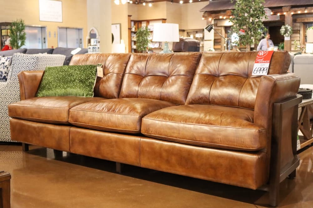 This Hancock & Moore Embrace Top-Grain Leather Sofa ($6,999) is more of a classic style. (Grant Johnson/Community Impact Newspaper)