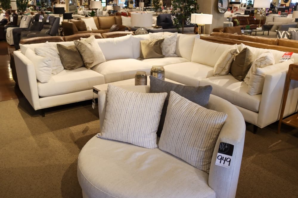 A transitional style blends traditional and modern styles, like this Jonathan Louis Pia Sectional ($2,499). (Grant Johnson/Community Impact Newspaper)