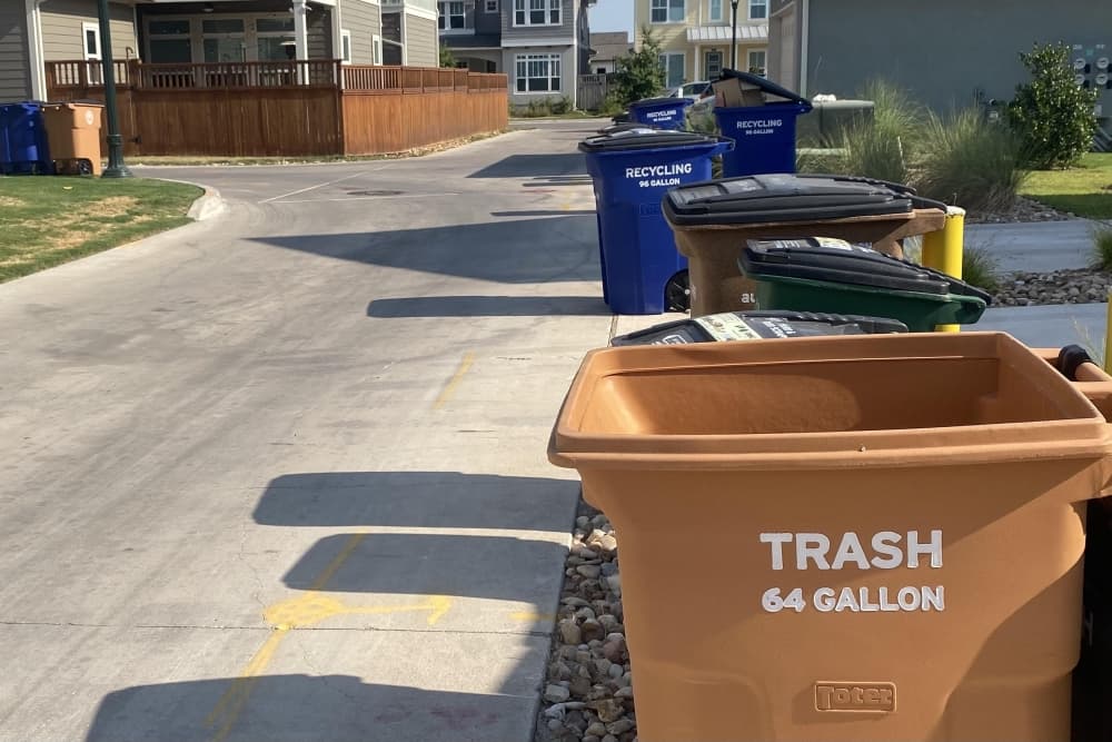 Austin asks residents to put trash out earlier so sanitation workers can avoid midday heat