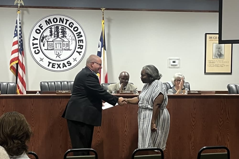 City Council Position 5 was vacant after Byron Sanford was elected to mayor. Patricia Easley (right) was sworn in July 12. (Peyton MacKenzie/Community Impact Newspaper)