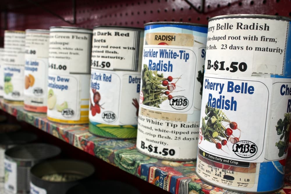 Pardner’s Garden & Feed offers seeds out of cans. (Karen Chaney/Community Impact Newspaper)