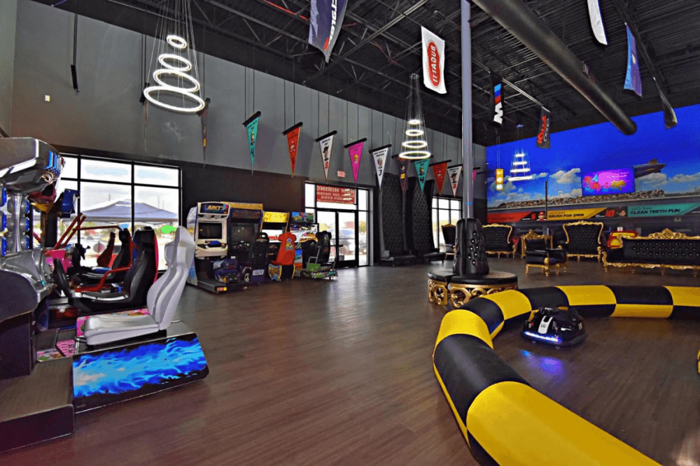The dental practice's lobby is decorated with entertainment, such as an arcade. (Courtesy Grand Prix Dental & Orthodontics)
