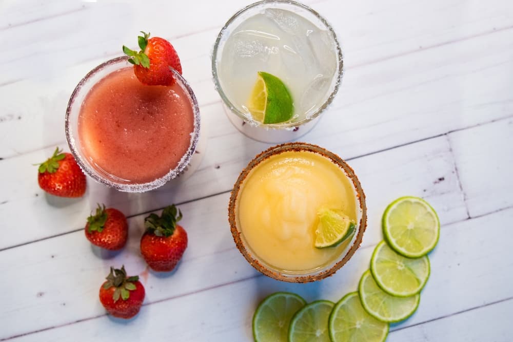 Three kinds of drinks with strawberries